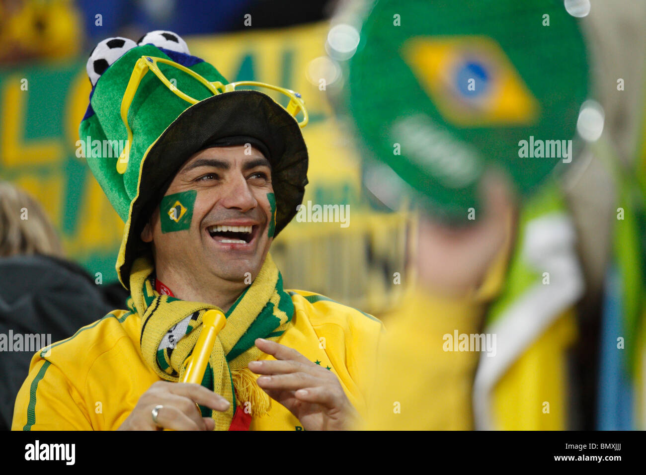 Smiling Brazil supporter at a 2010 FIFA World Cup football match between Brazil and Côte d'Ivoire June 20, 2010. Stock Photo