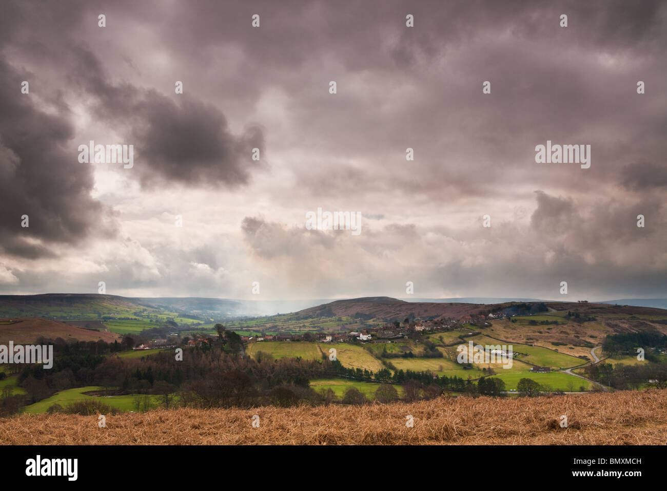 Moody skies growing over castleton in North yorkshire. Stock Photo