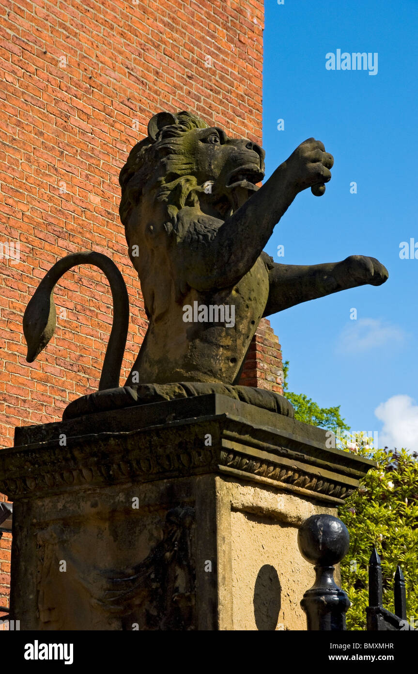 Close up of statue of lion on gatepost at Gray's Court Hotel York North Yorkshire England UK United Kingdom GB Great Britain Stock Photo