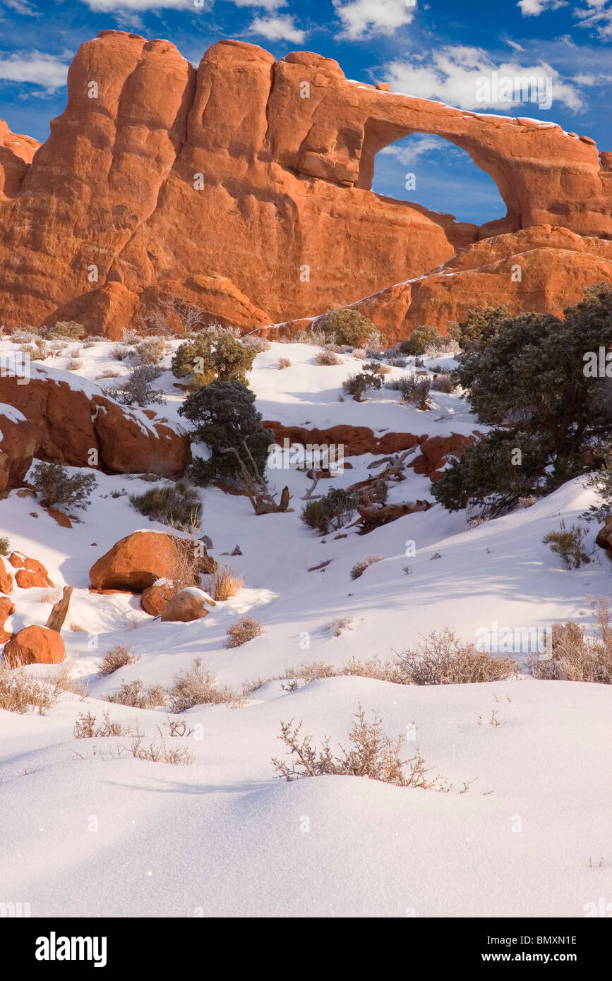 Winter snow on Skyline Arch in Arches National Park southeastern Utah USA Stock Photo