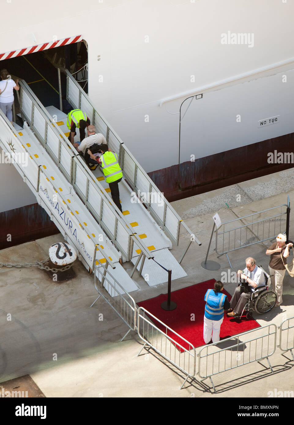 Care and attention given passengers in wheelchairs boarding the P&O liner Azura in Gibraltar Stock Photo