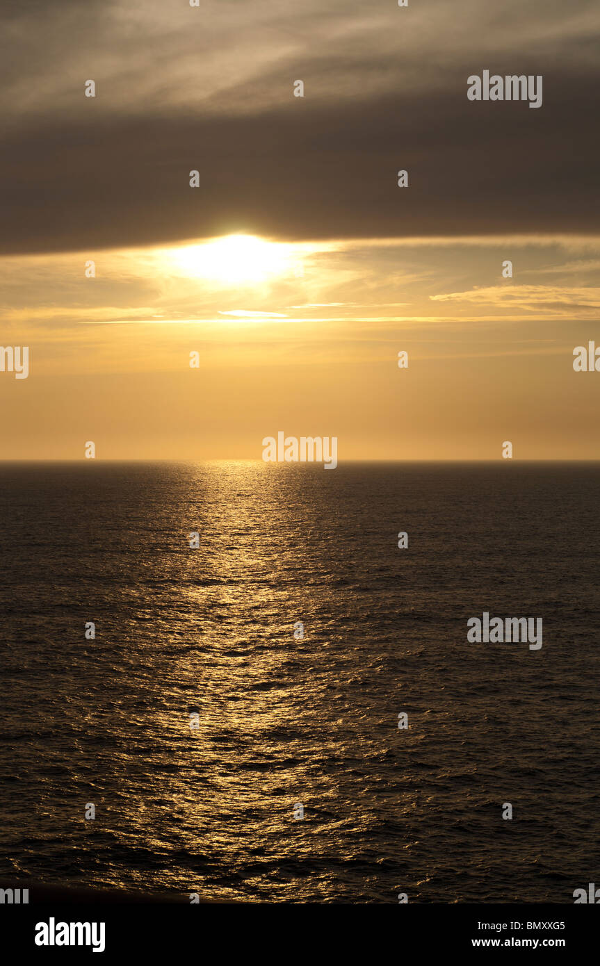 A golden sunset at sea Stock Photo - Alamy