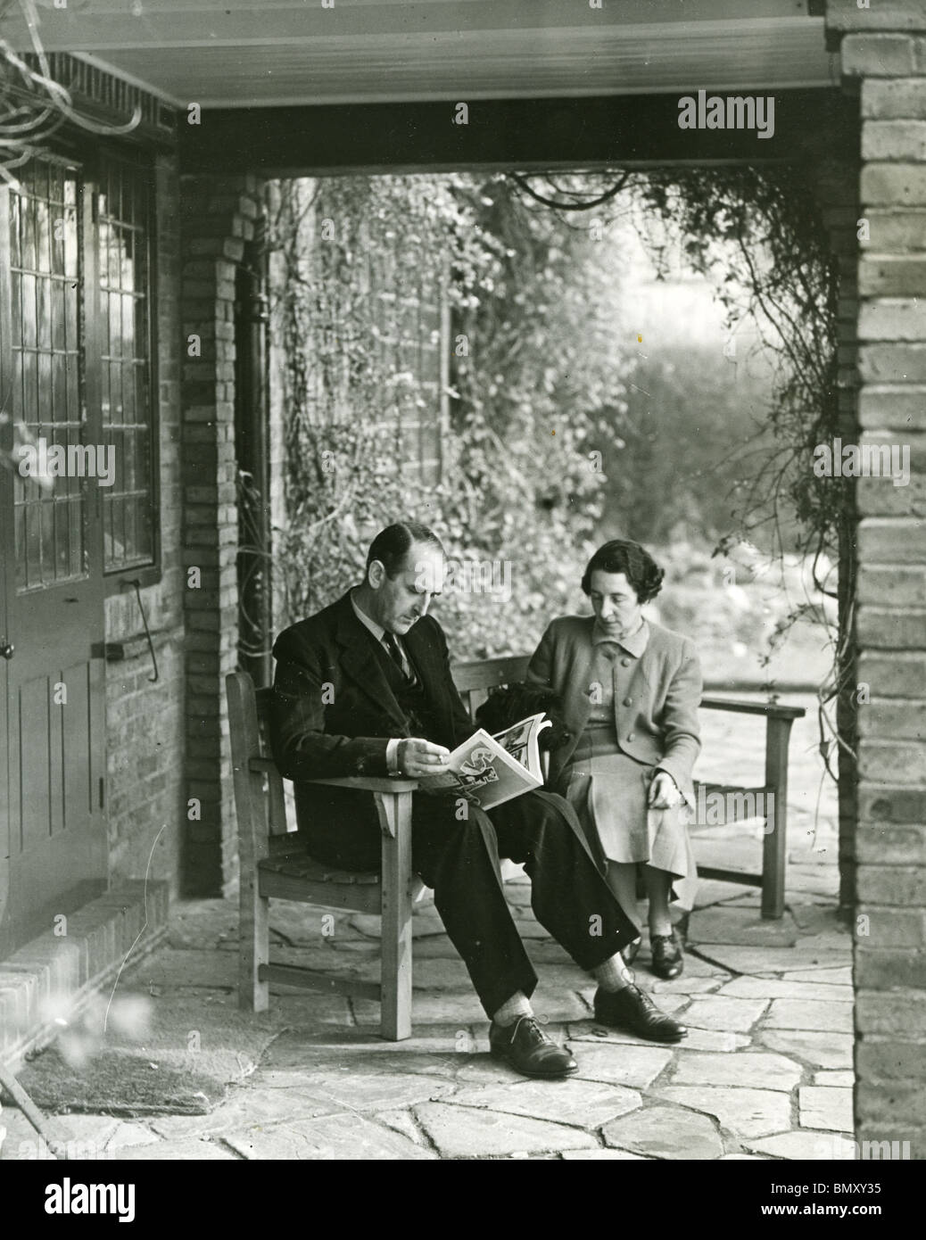 SIDNEY CAMM - English aeronautical engineer at his home in Thames Ditton, Surrrey in 1941 with his wife Hilda Starnes Stock Photo