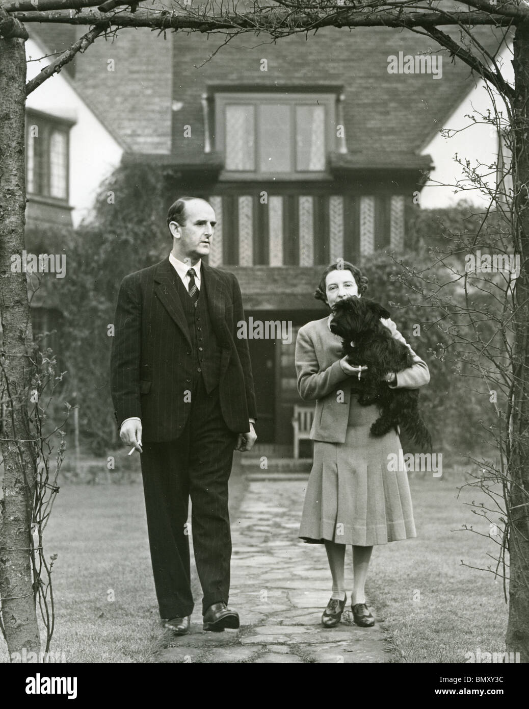 SIDNEY CAMM - English aeronautical engineer at his home in Thames Ditton, Surrrey in 1941 with his wife Hilda Starnes Stock Photo