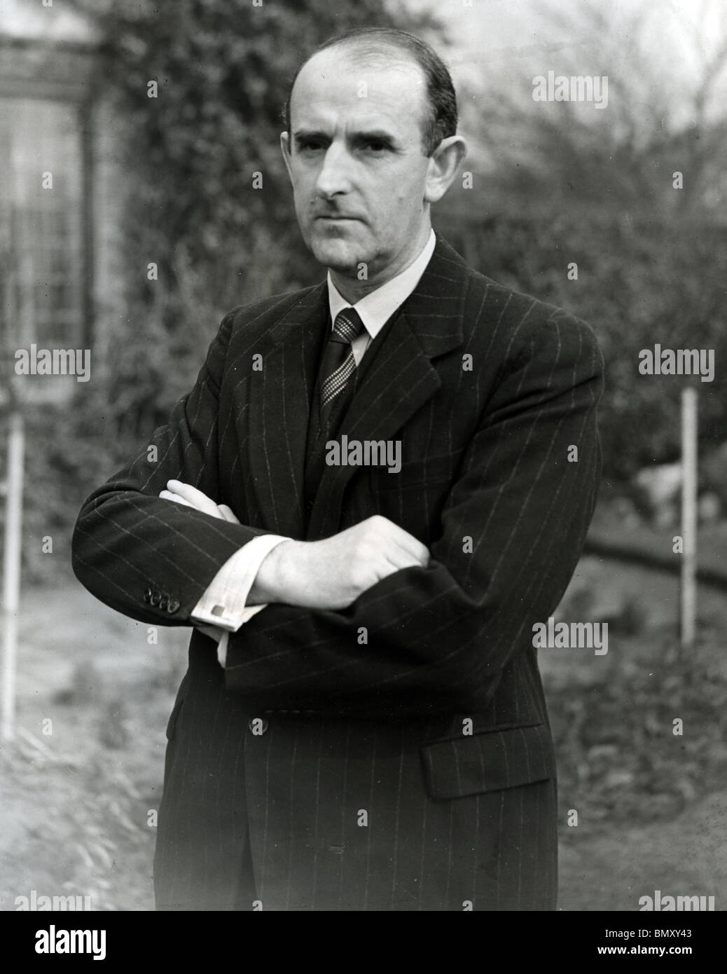 SIDNEY CAMM  (1893-1966) English aeronautical engineer at his home in Thames Ditton, Surrrey in 1941 Stock Photo