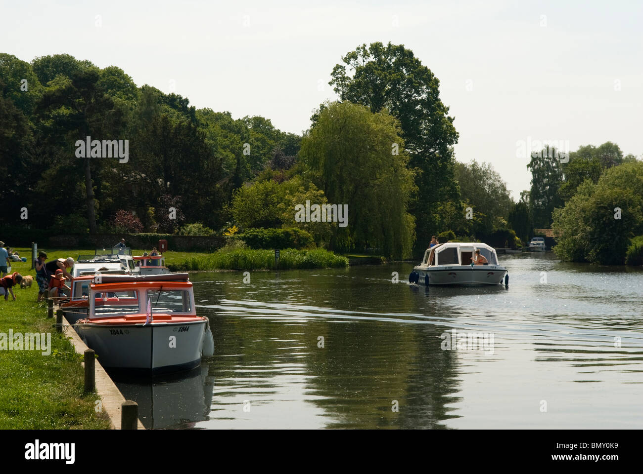 Boats on the River Bure at Coltishall, Norfolk Broads, England. Stock Photo