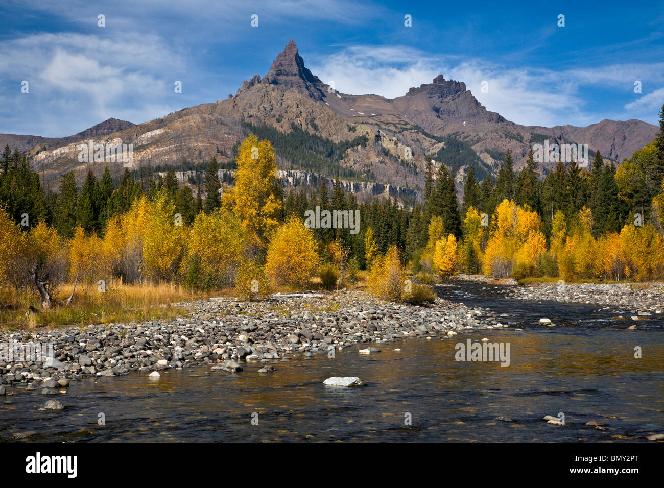 Shoshone National Forest, WY View of Pilot peak and from along the Clark's Fork River with fall colored cottonwoods Stock Photo