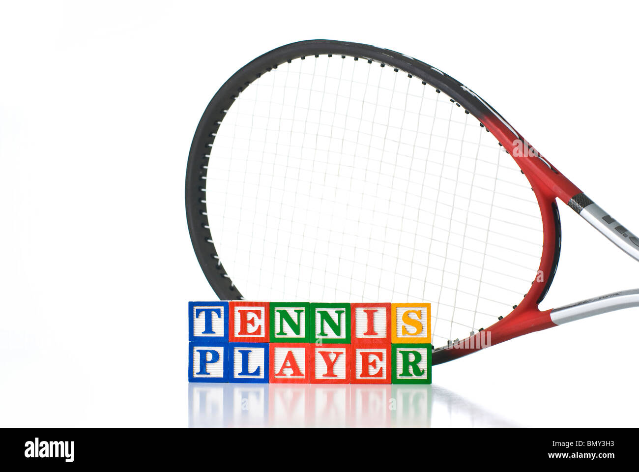 Colorful children's blocks spelling TENNIS PLAYER with tennis racket