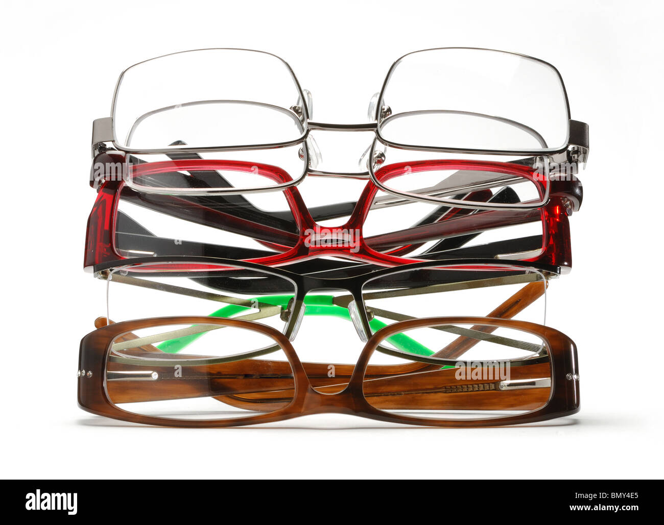 A stack of colorful eye glasses on a white background Stock Photo