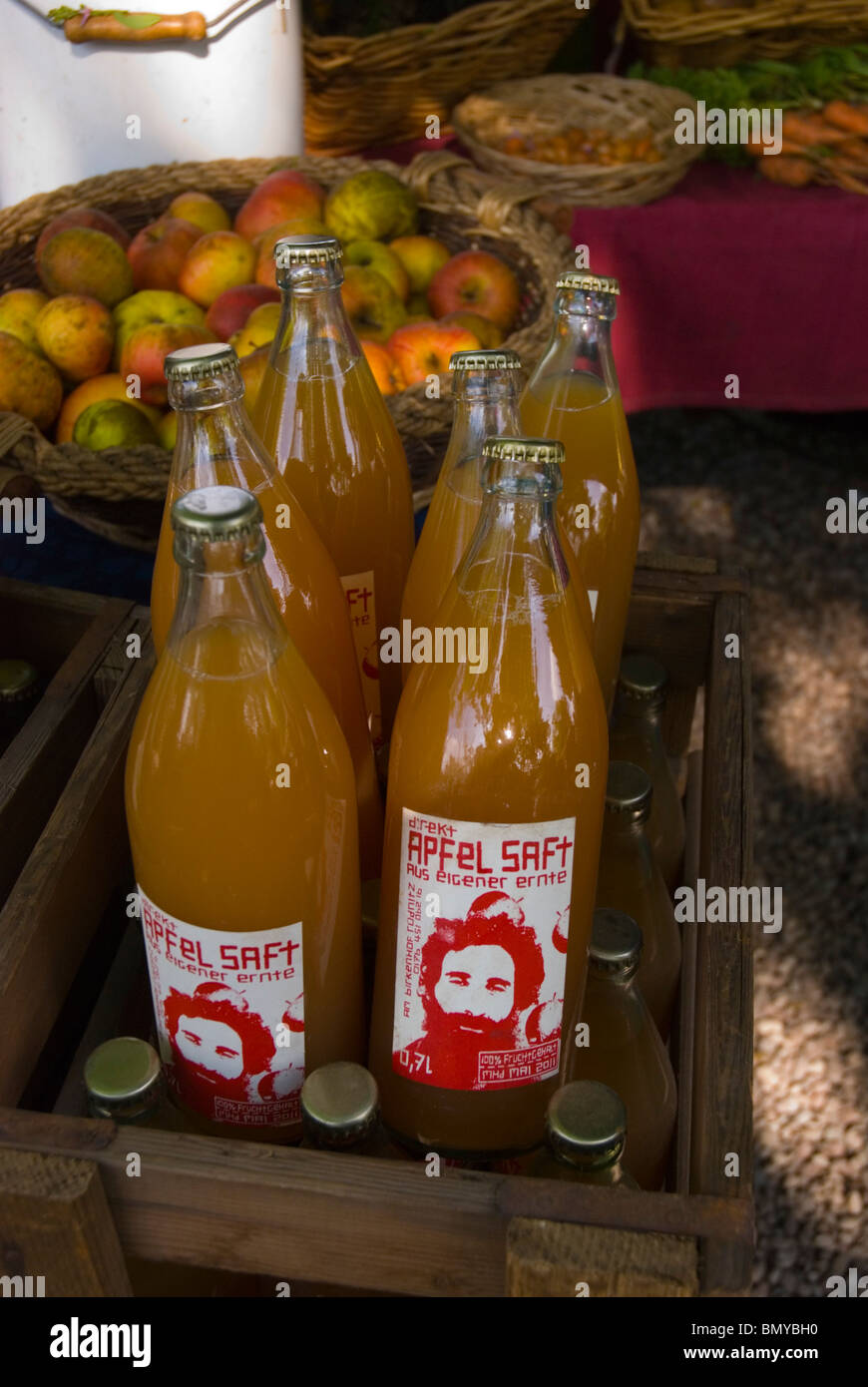 Organic independently sold apple juice Mauerpark flea market Mitte central Berlin Germany Eurore Stock Photo