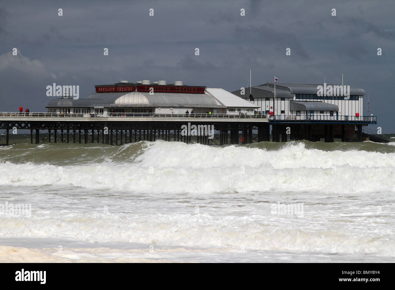 Cromer weather . High winds and seas creating nice waves around Cromer pier  in North Norfolk Stock Photo - Alamy