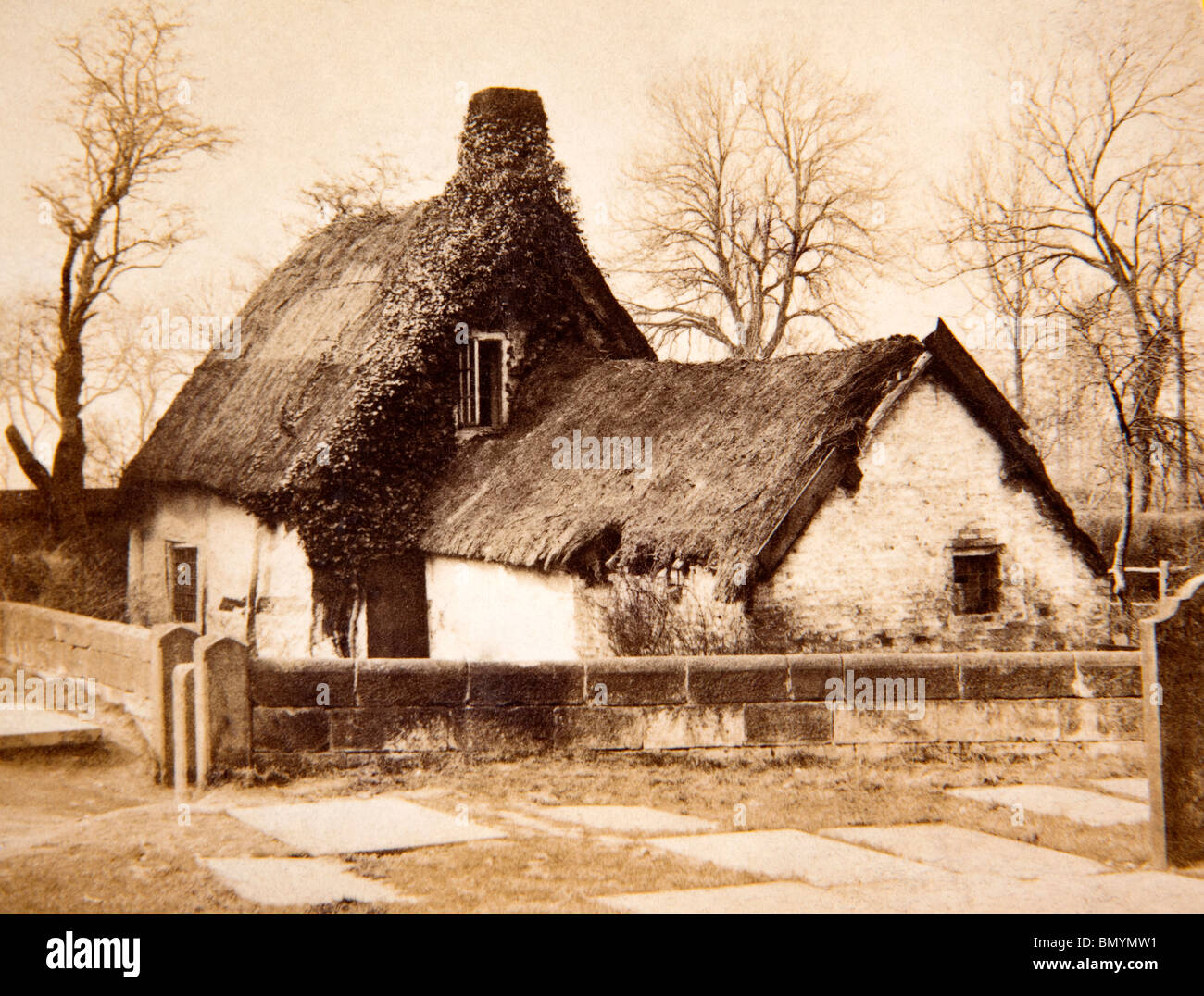 UK, England, Cheshire, Cheadle, old thatched cottage in St Mary’s Churchyard in 1860s (now demolished) Stock Photo