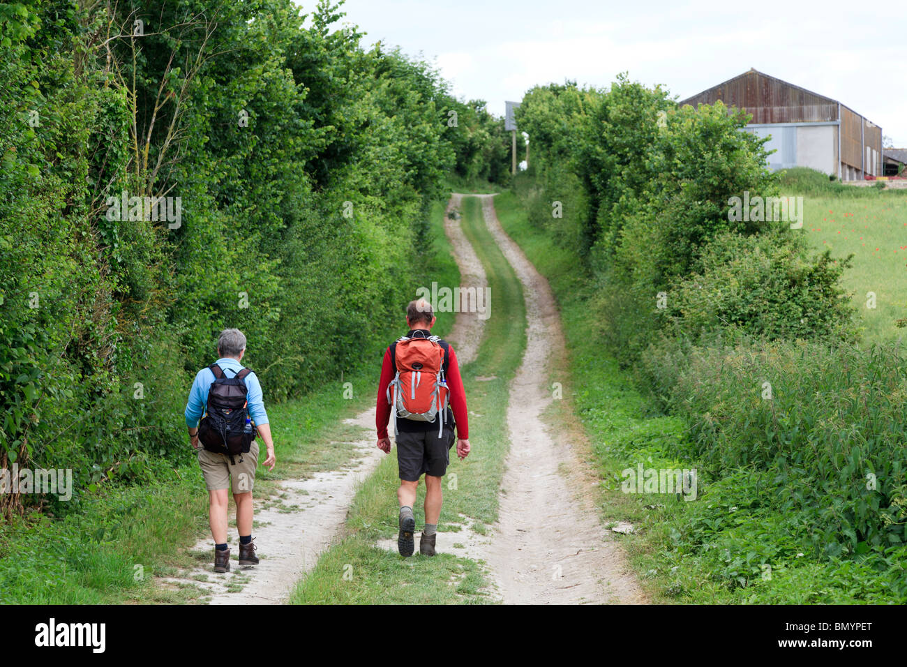 Man woman behind walking hi-res stock photography and images - Alamy