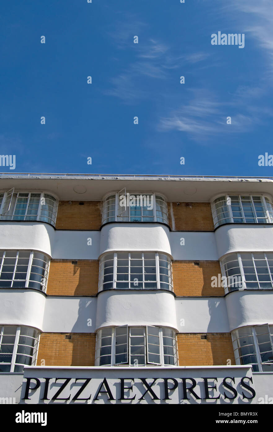 art deco flats of the 1930s with a branch of pizza express at ground