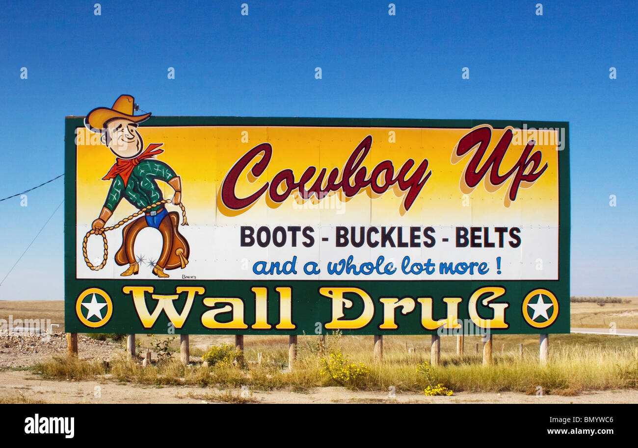 Wall Drug sign cowboy near Wall South Dakota Stock Photo Alamy