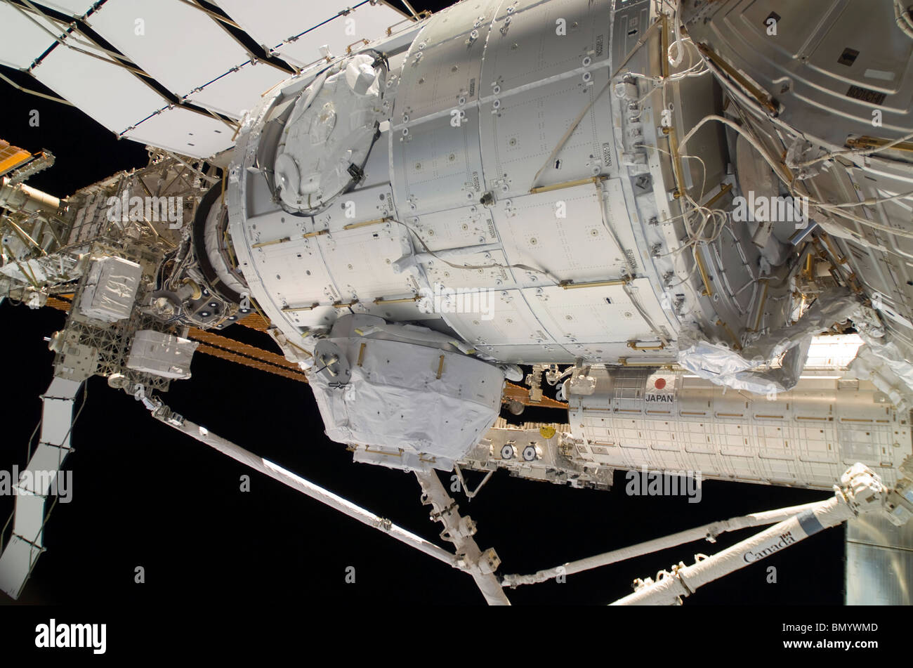 The Pressurized Mating Adapter 3 in the grasp of the Canadarm2. Stock Photo