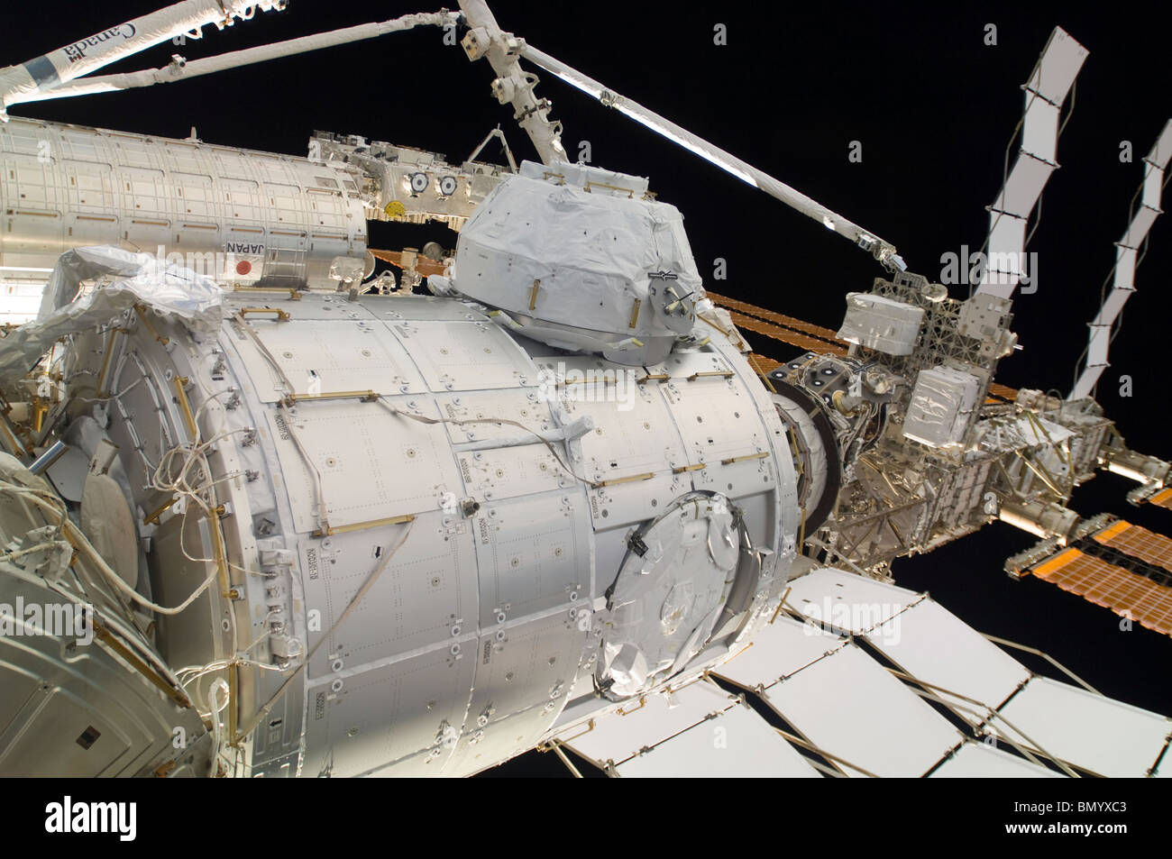 The Pressurized Mating Adapter 3 in the grasp of the Canadarm2. Stock Photo