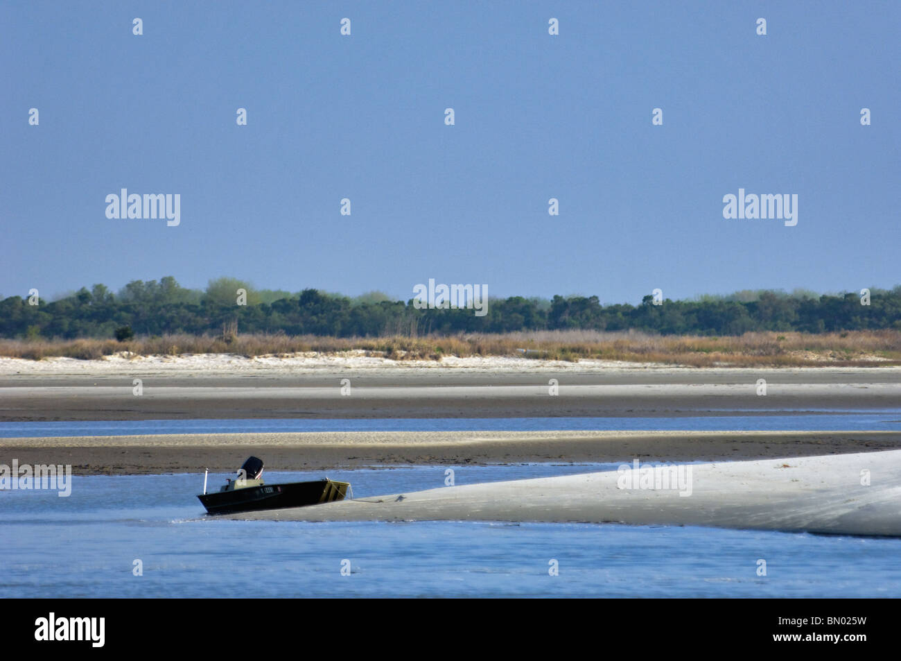 Small Boat Beached on Morris Island in Charleston County, South Carolina Stock Photo