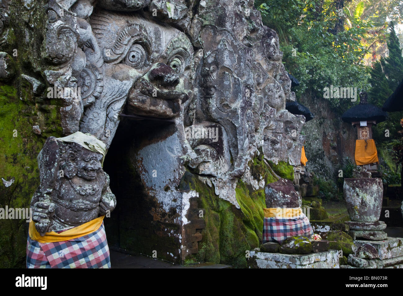 Goa Gajah, commonly known as the Elephant Cave, is located in a steep valley just outside of Ubud near the village of Bedulu. Stock Photo