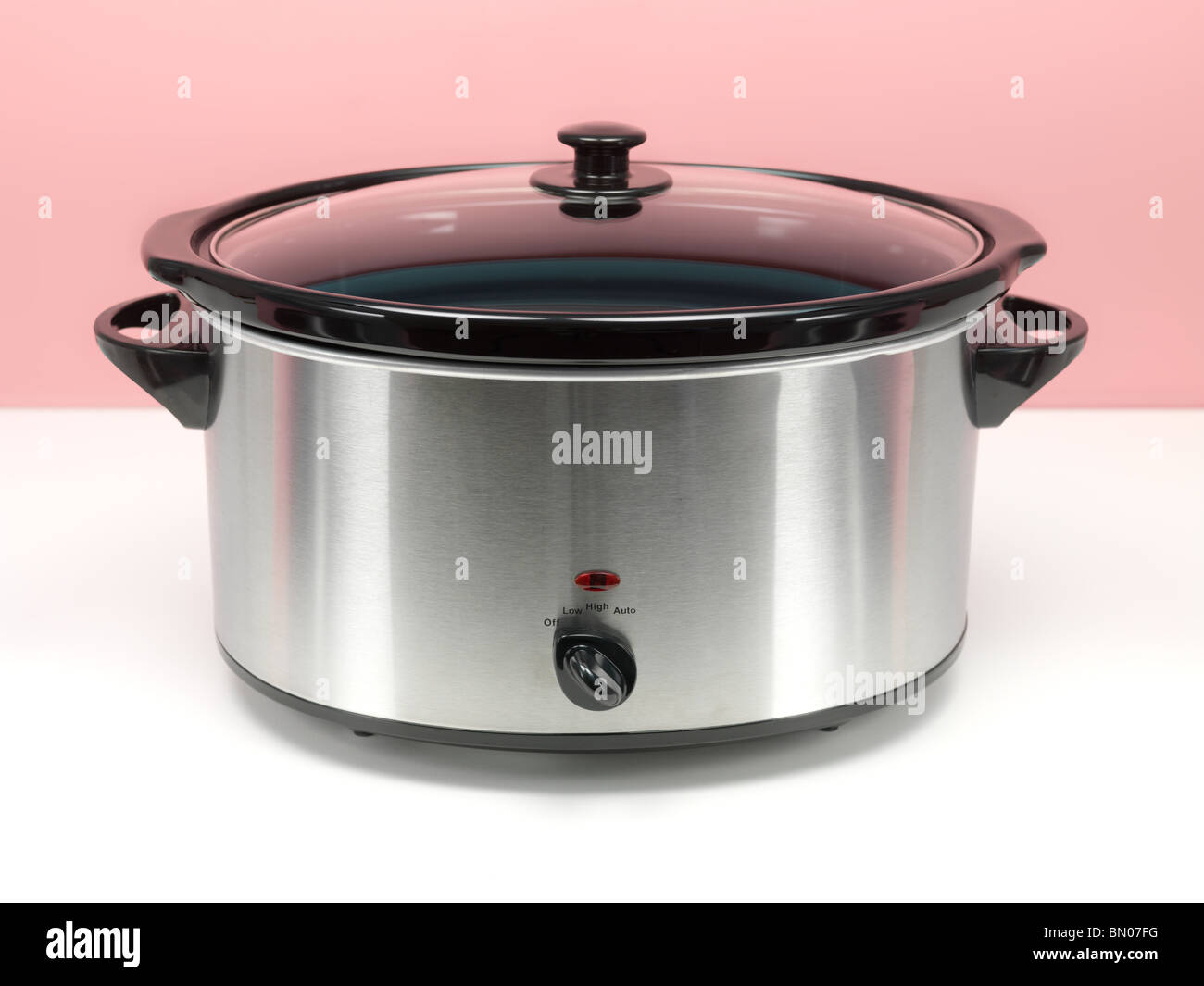 An electric slow cooker Stock Photo Alamy