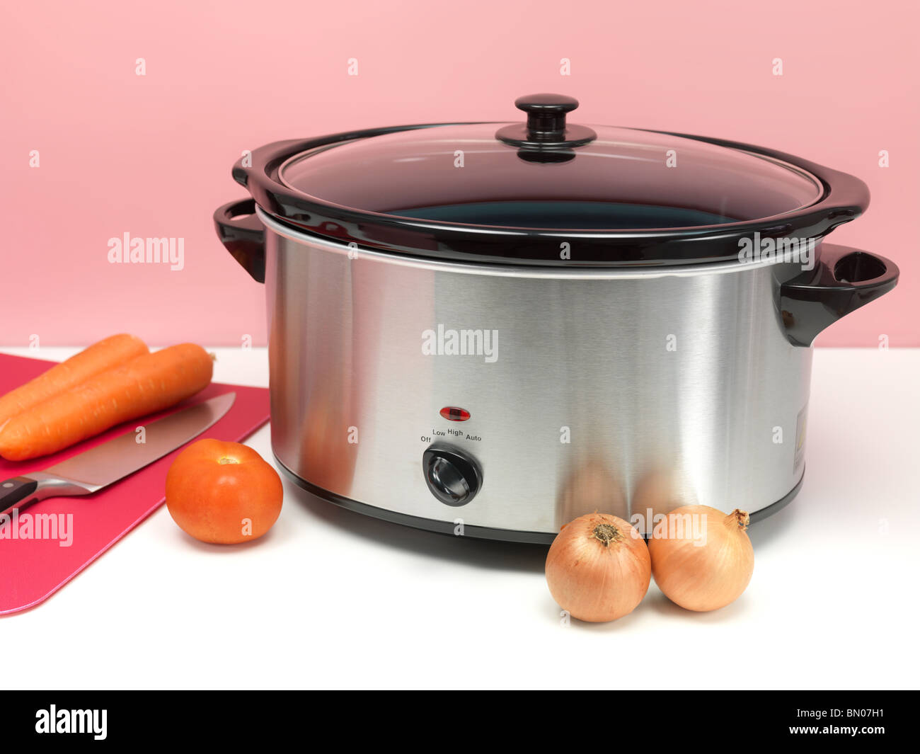 An electric slow cooker Stock Photo Alamy
