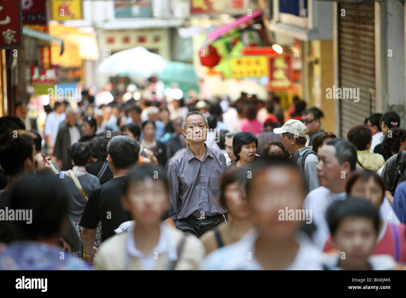 A busy shopping street, Macao, China Stock Photo