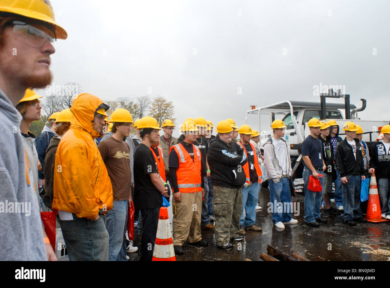 teenagers waiting for construction jobs Stock Photo