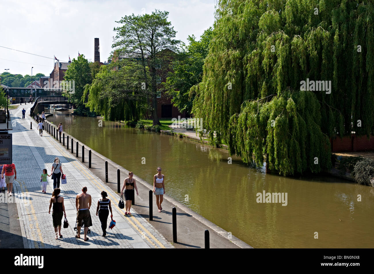 Pedestrians walking alongside the Chester Canal, Chester, Cheshire, UK Stock Photo
