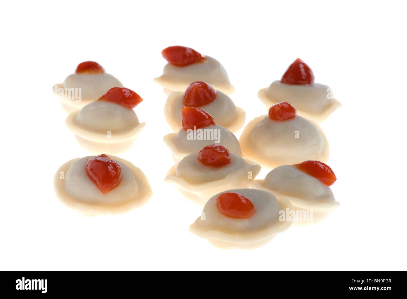 object on white - food Raw pelmeni Stock Photo
