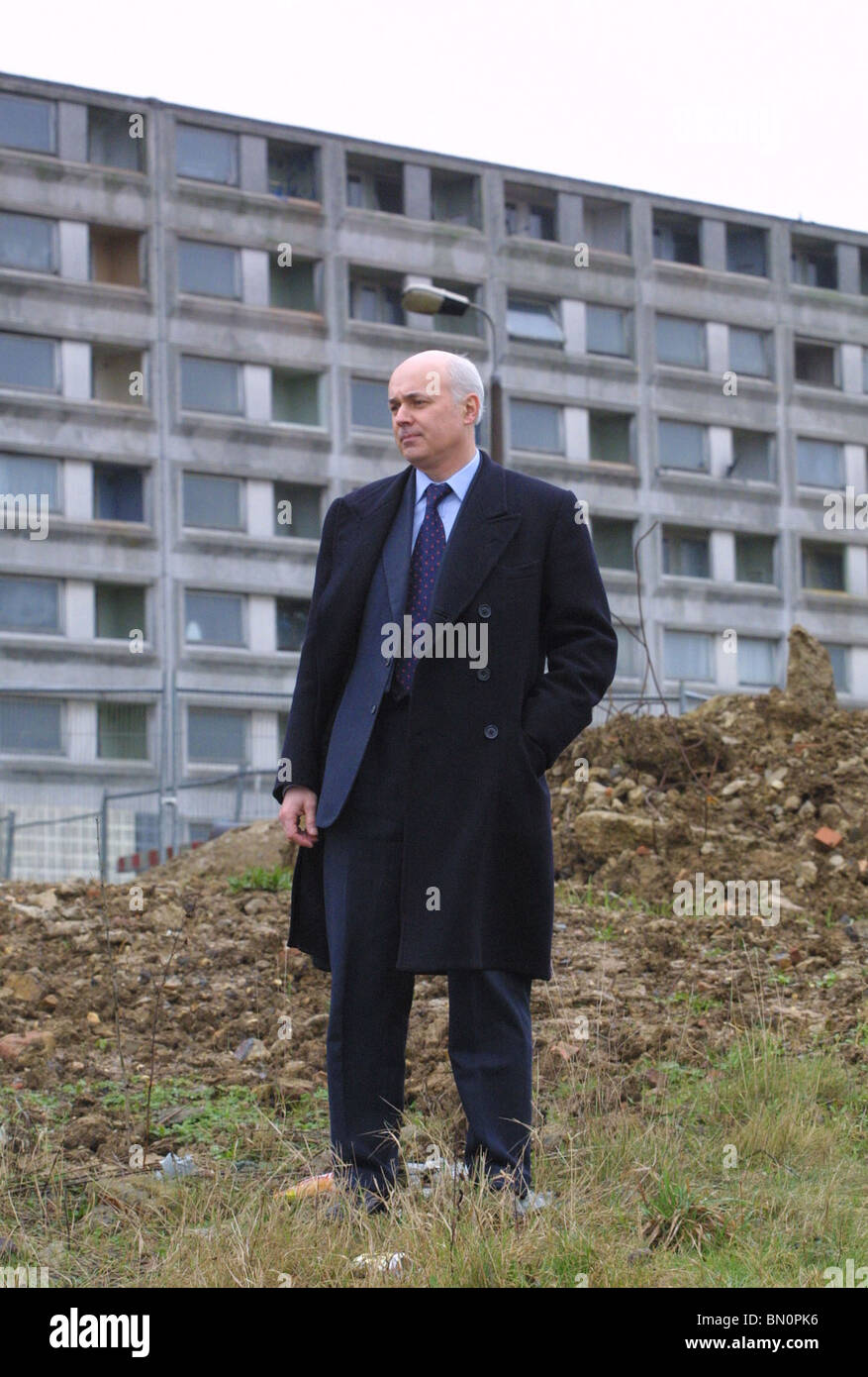 The Right Honourable  Iain Duncan Smith  MP by tower block Stock Photo