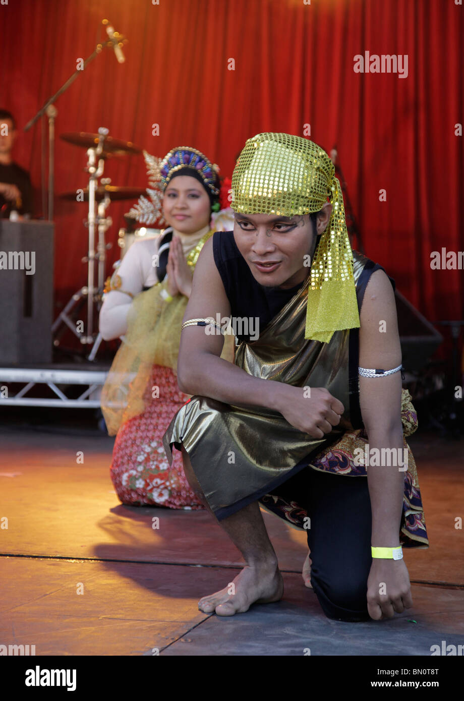 Two Malaysian dancers at a performance at the Glasgow Mela 2010 Stock Photo