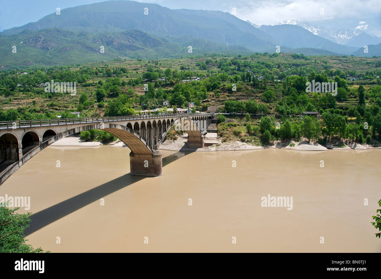 Road bridge across Upper Yantse River Yunnan China Stock Photo