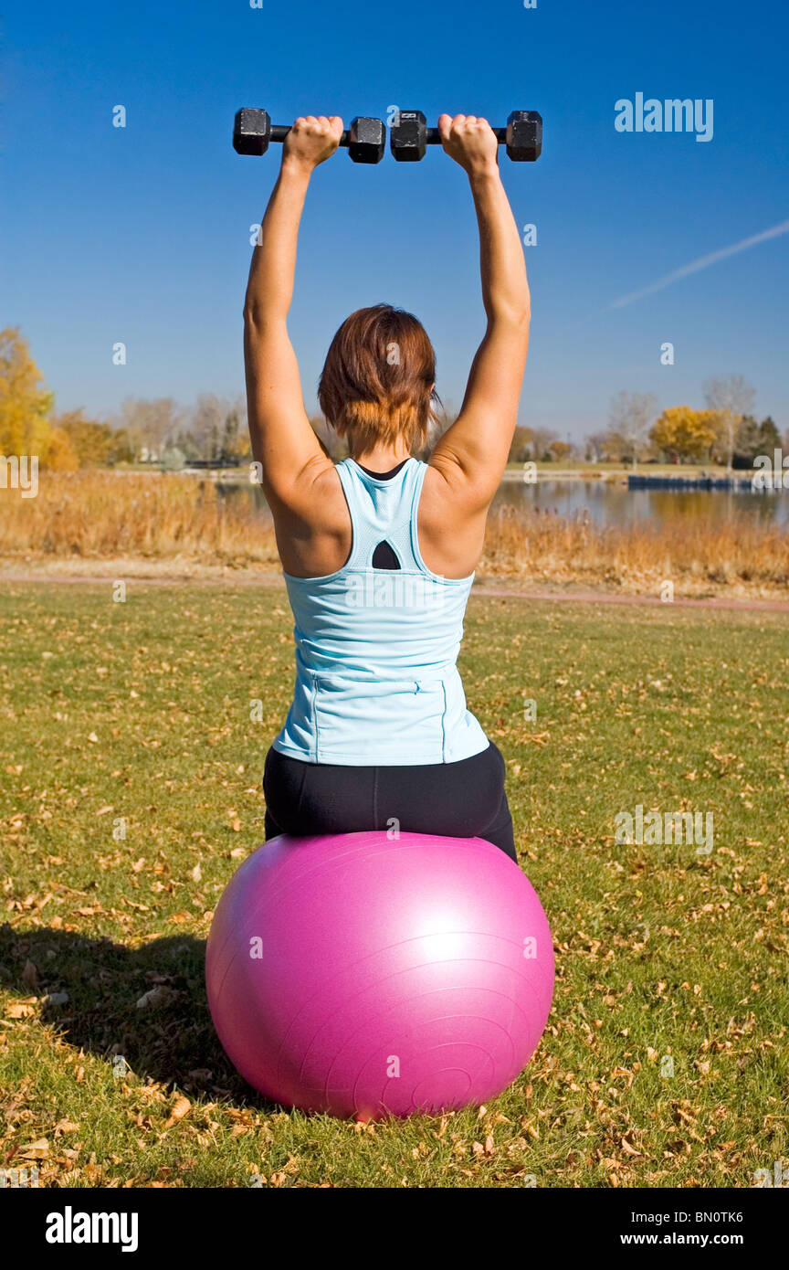 Swiss ball dumbbell press hires stock photography and images Alamy