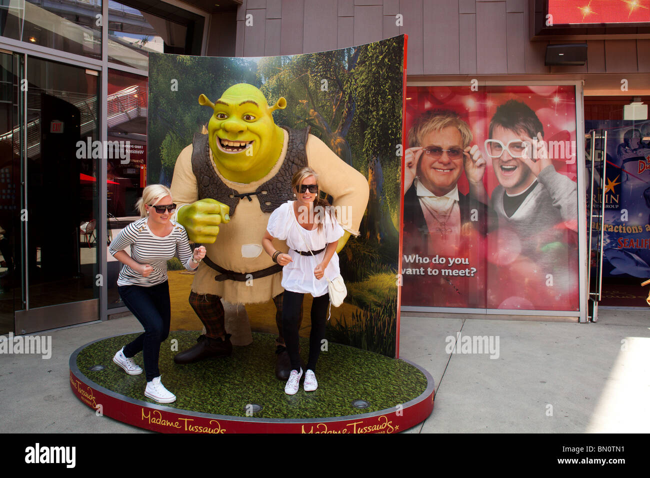 Posing with Shrek at Madame Tussaud's Wax Museum, Hollywood, Los Angeles, California, United States of America Stock Photo