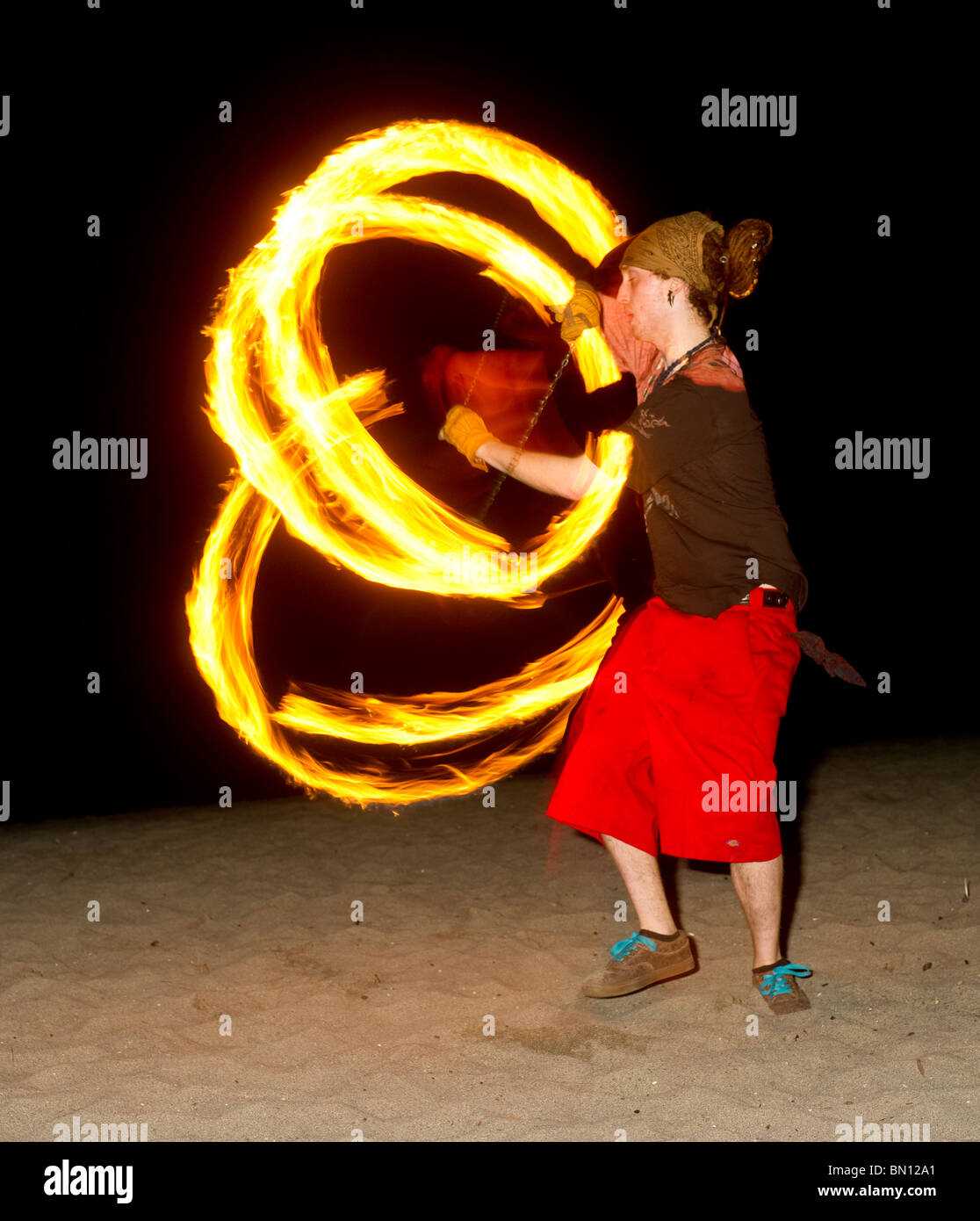 Fire Dancers Perform on Golden Gardens Beach in Seattle WASHINGTON