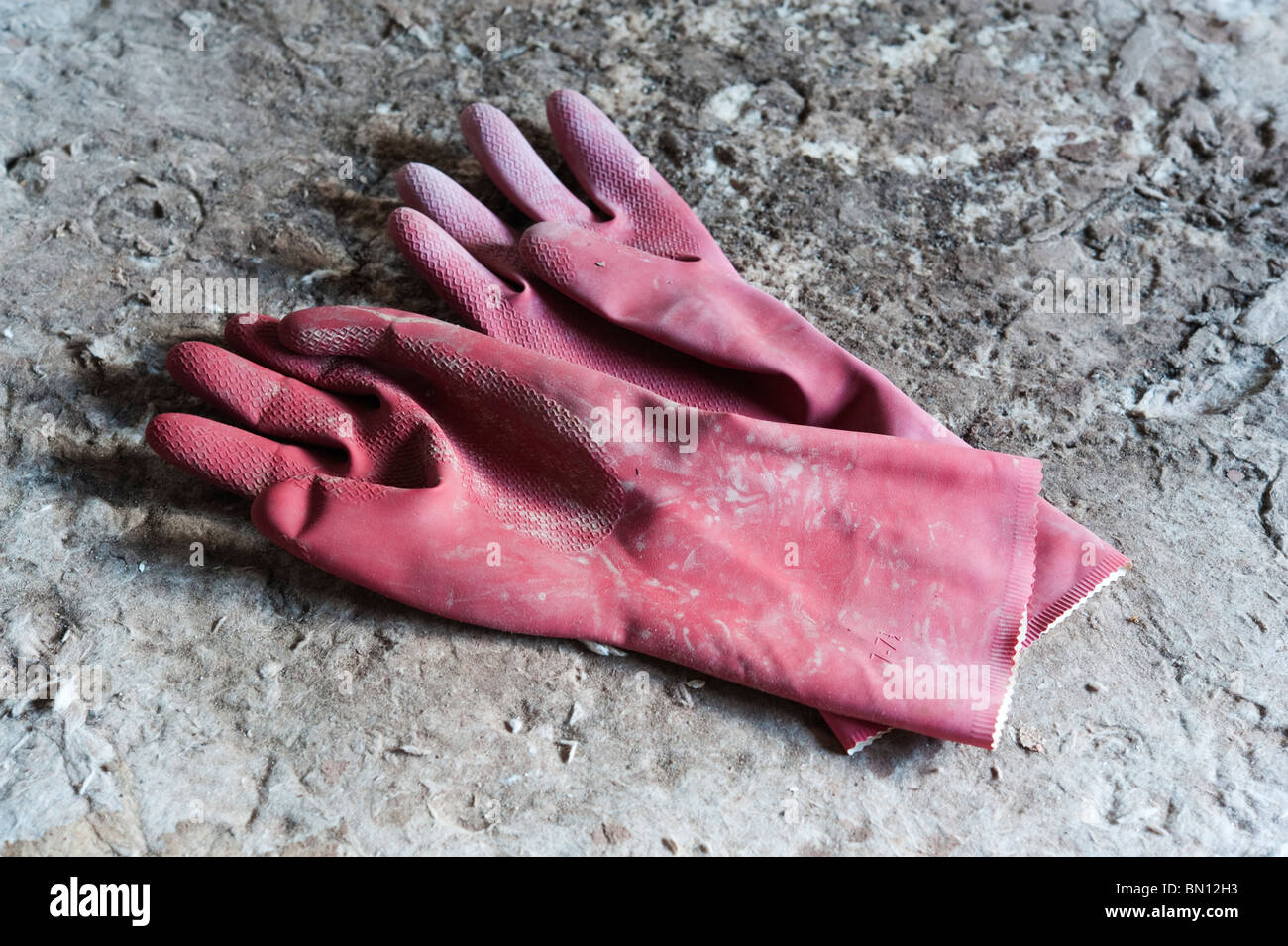 Used rubber gloves hi-res stock photography and images - Alamy