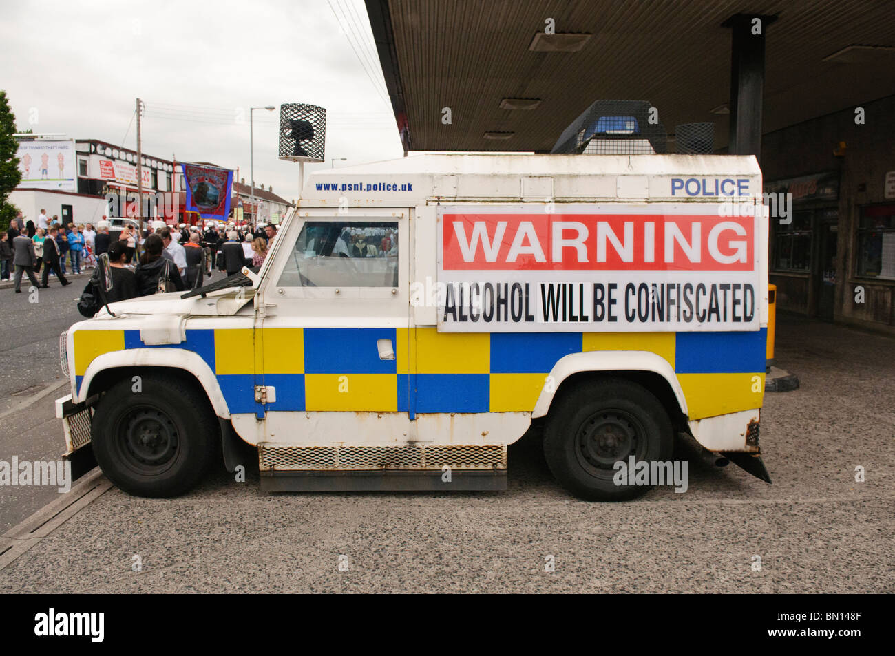 'Warning.  Alcohol will be confiscated' notice on the side of an armoured Landrover, Newtownabbey, Northern Ireland Stock Photo