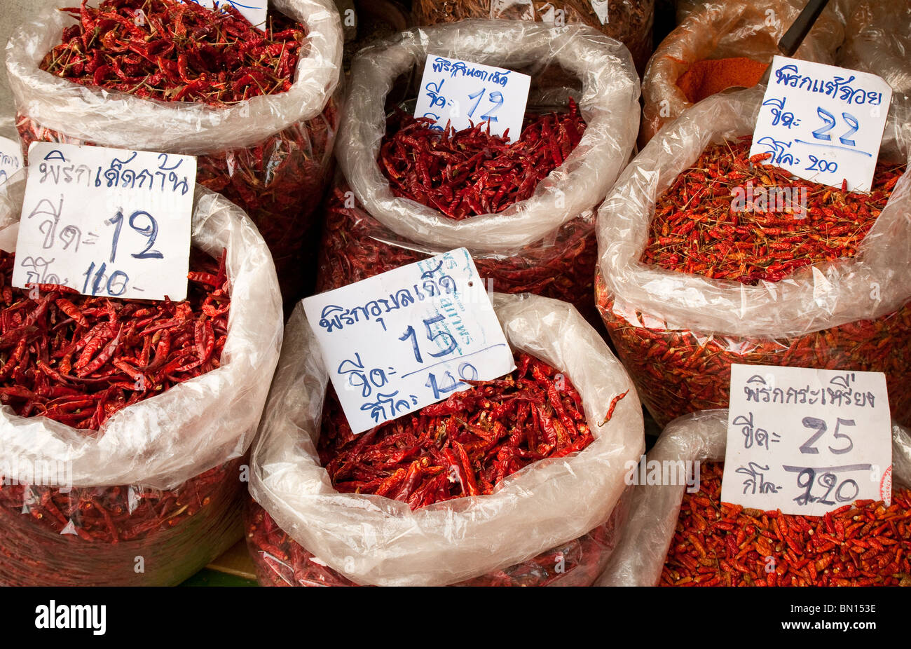 Chili peppers for sale at Pratu Chiang Mai market in Chiang Mai, Thailand. Stock Photo