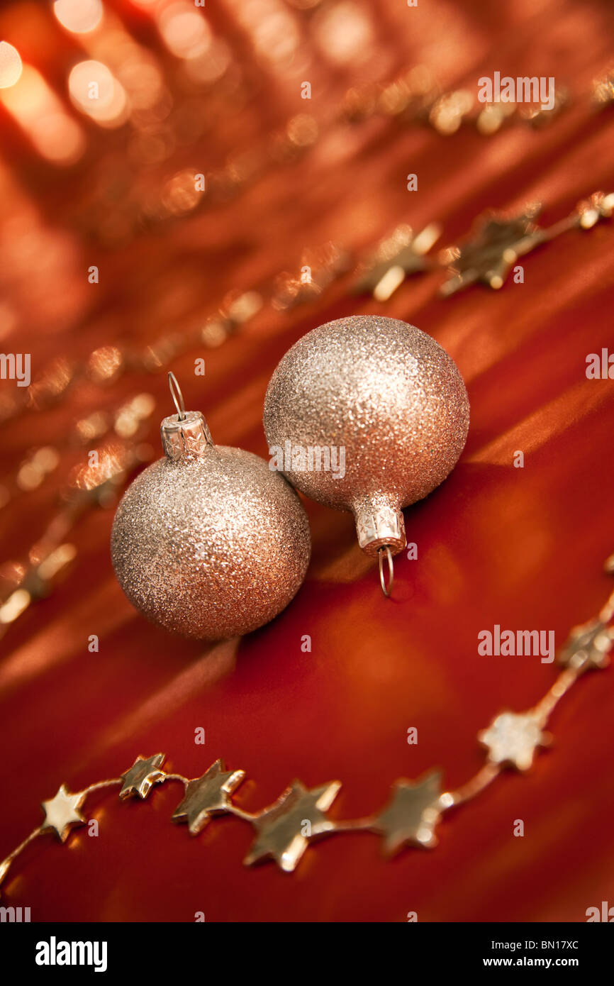 Christmas decoration with two silver baubles. Shallow depth of field, focus on bauble, aRGB. Stock Photo