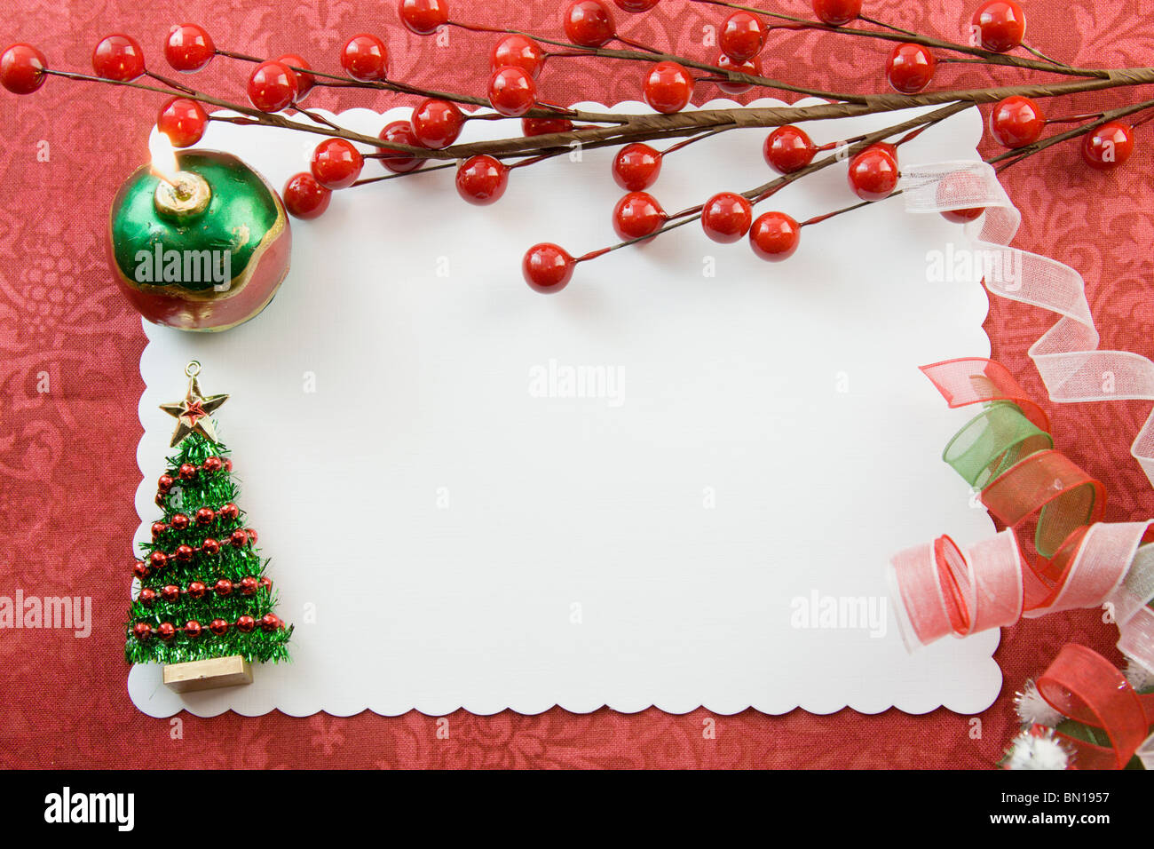 blank Christmas card with berry accent, ornament candle, tinsel tree