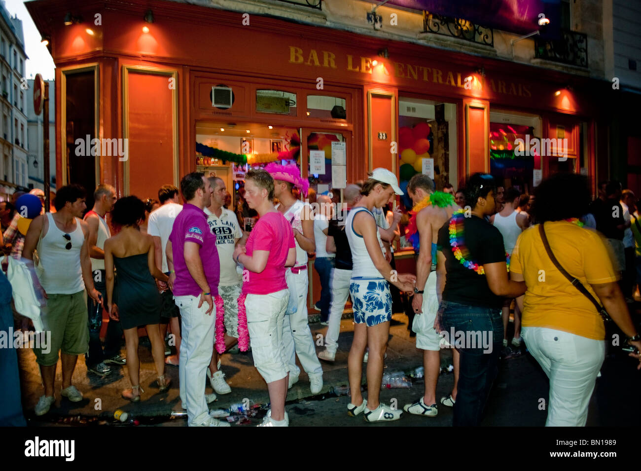 Paris, France, Large Crowd of People Celebrating, Sharing Drinks outside on Street, After LGTB Gay Pride in the Marais District, Night, Local Gay Bars, Night, 'Le Central Bar' (now closed) Young adults on holiday, teen alcohol Stock Photo