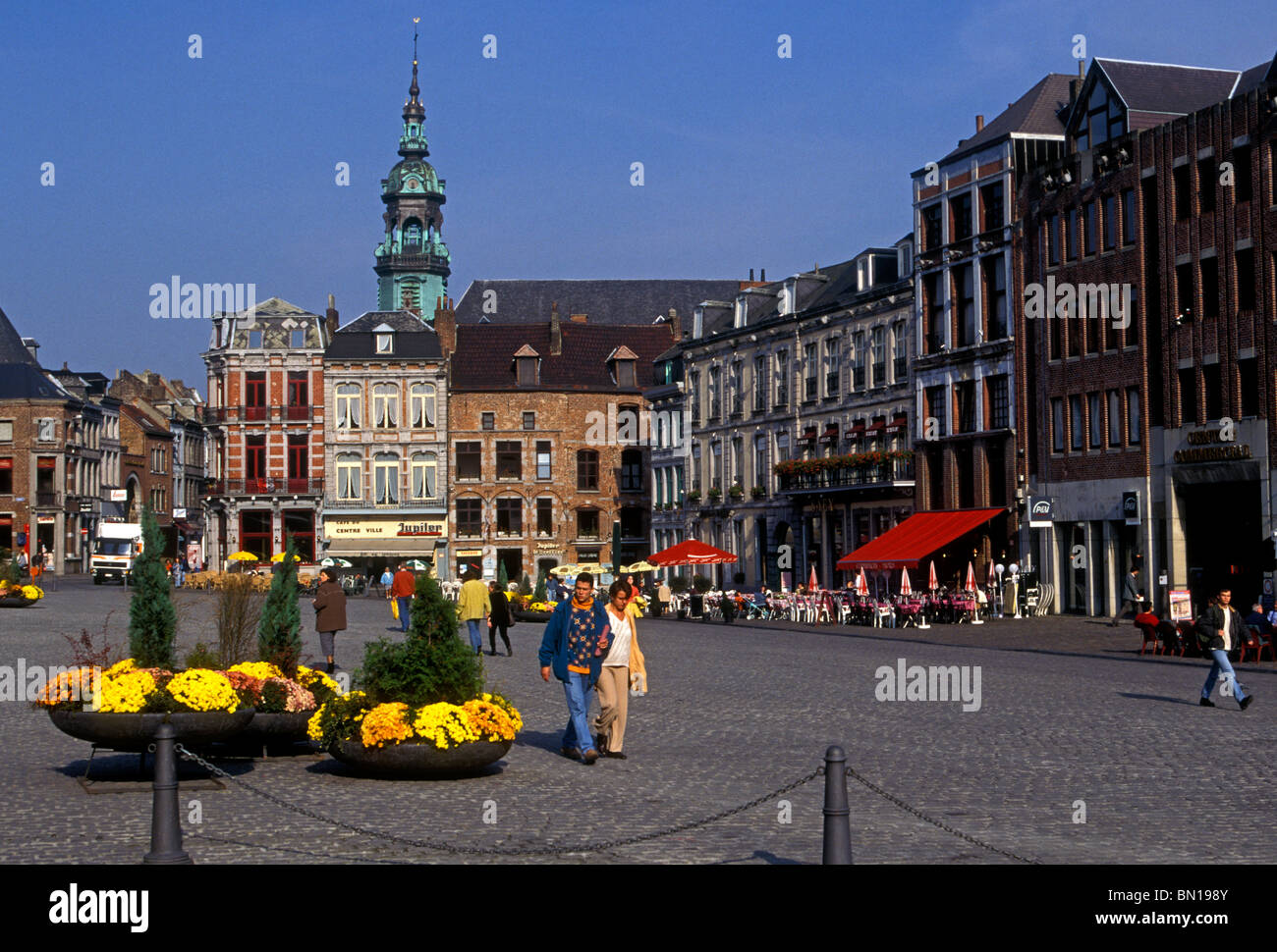 People walking in Grand Place city of Mons Walloon Region Belgium Europe Stock Photo