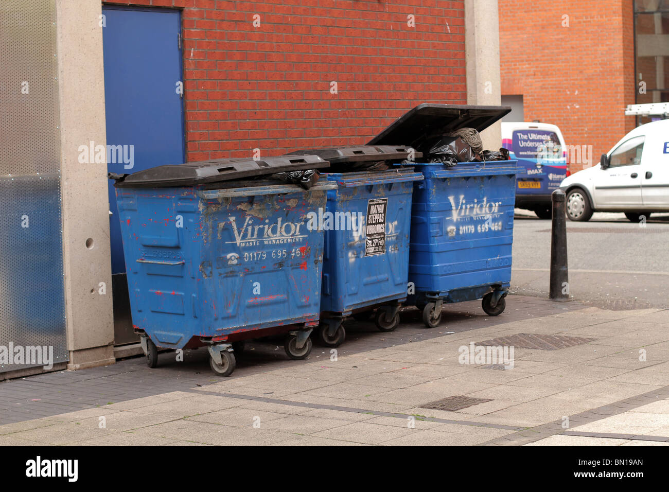 Commercial waste bins ready for collection Stock Photo Alamy
