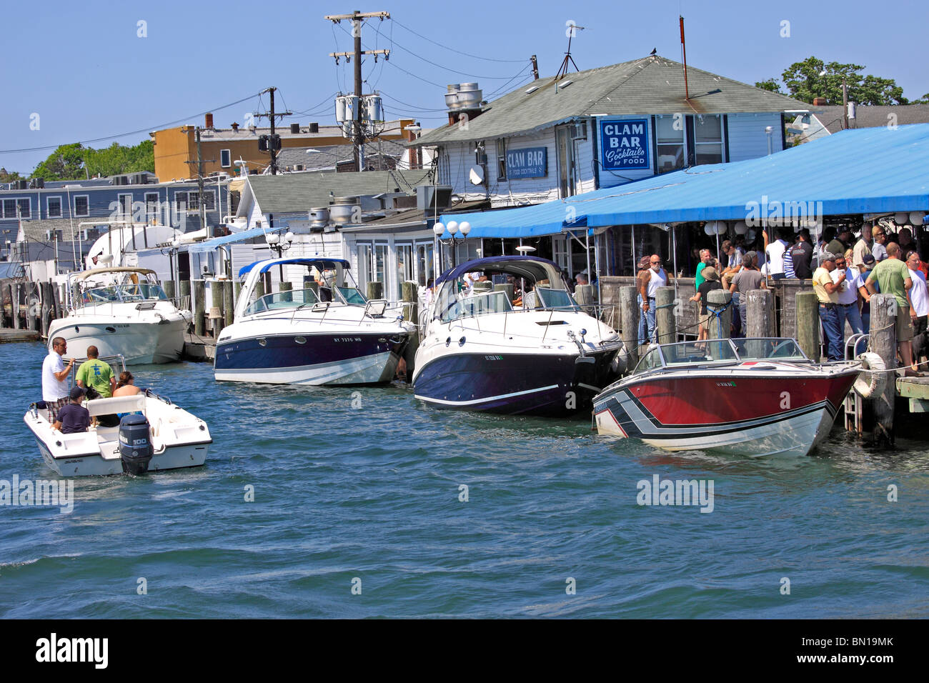 People gathered at Claudio's marina in Greenport Harbor on the eastern