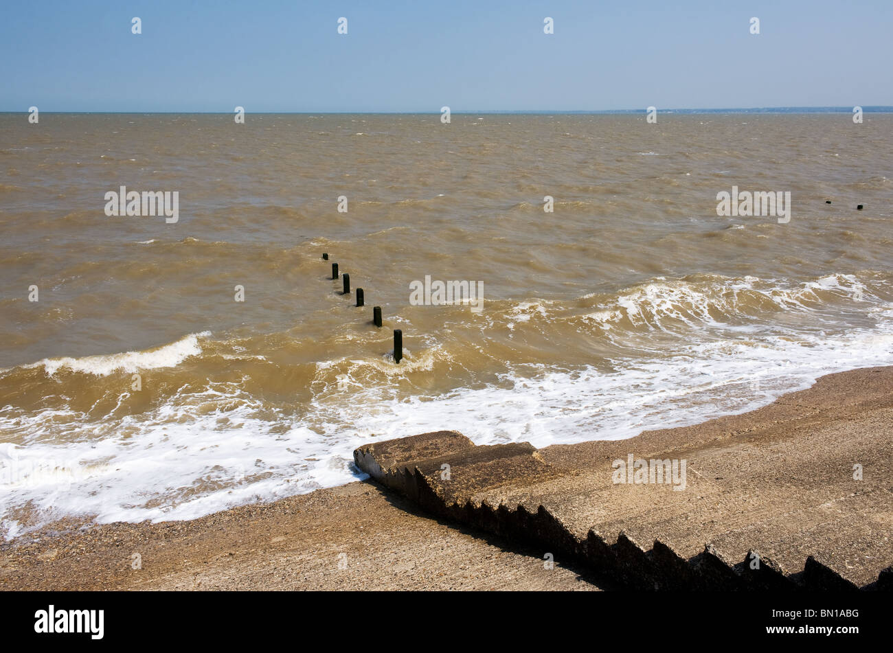 Steps leading down to the sea at Leysdown beach on the Isle of Sheppey