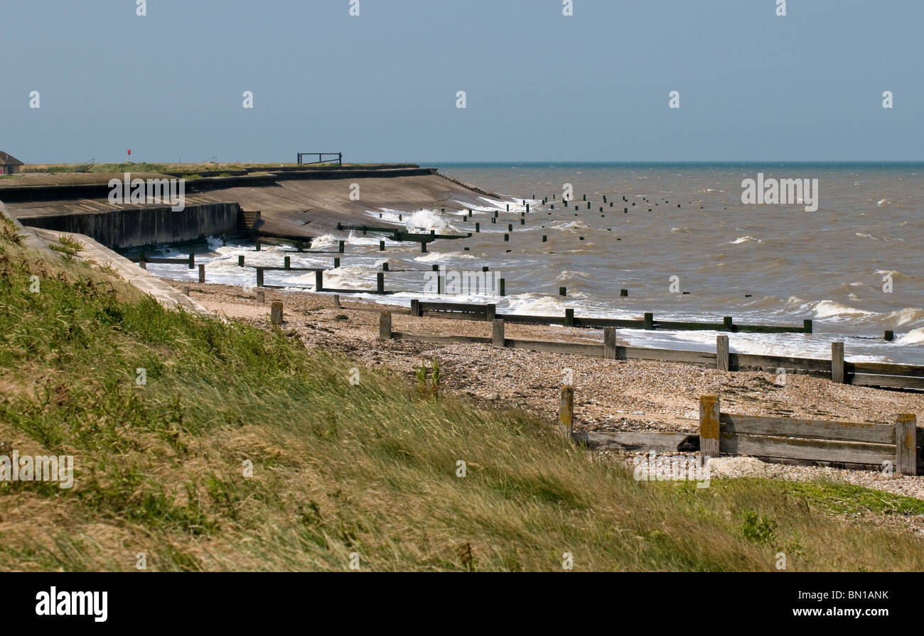 High tide at Leysdown Beach on the Isle of Sheppey in Kent. Stock Photo