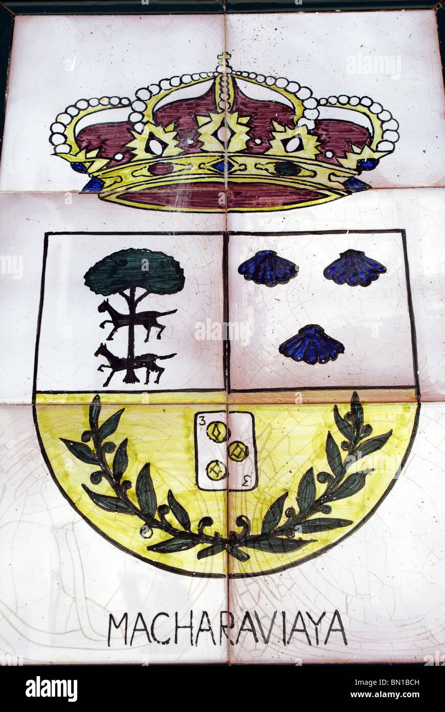 Village crest/coat of arms, whitewashed village (pueblo blanco), Macharaviaya, Costa del Sol,  Andalucia, Spain. Stock Photo