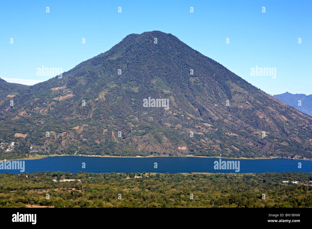 Atitlan lake and volcano San Pedro (3019 m), Guatemala Stock Photo