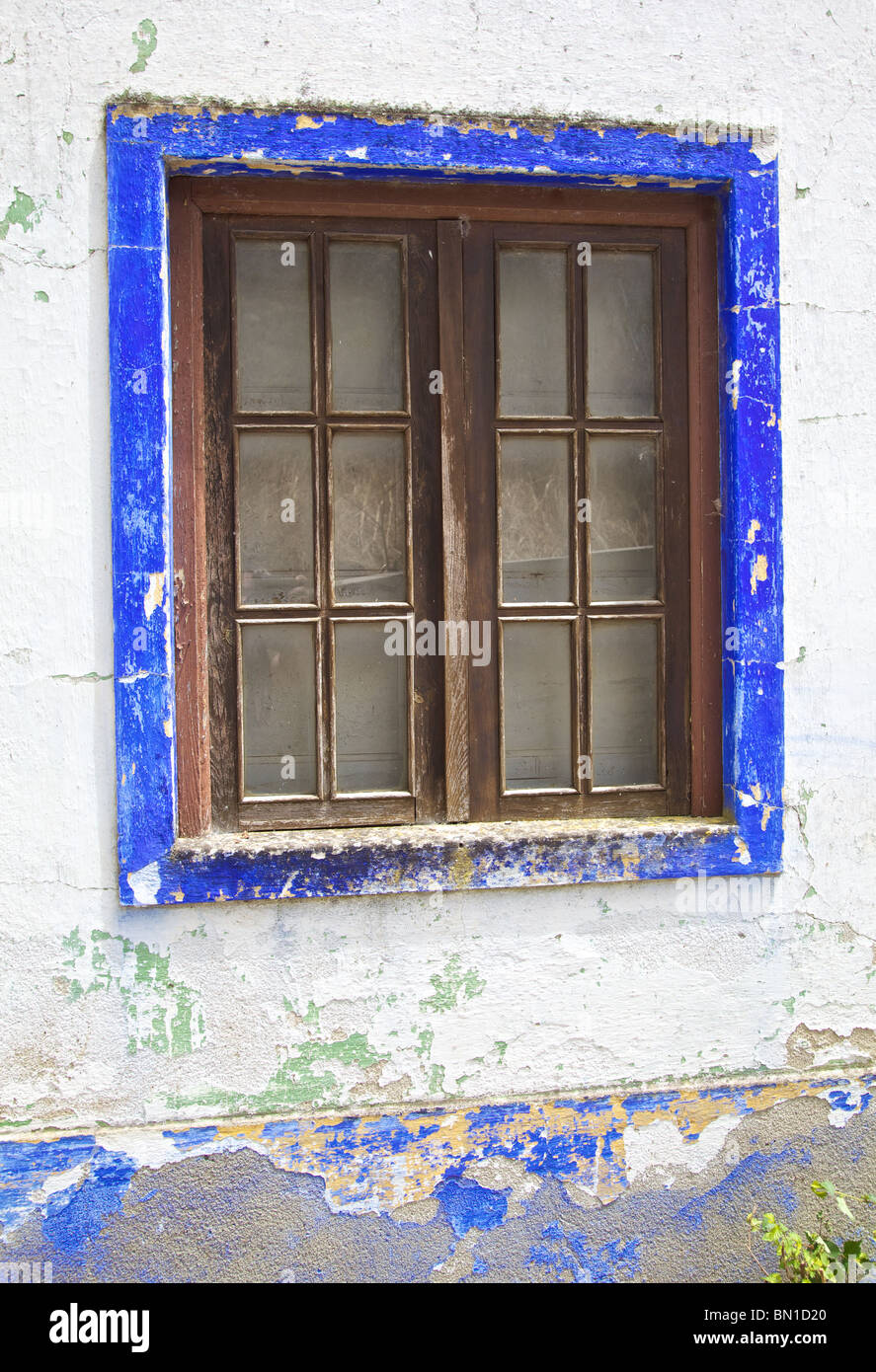 Brown Rustic Wood Window outlined with a Blue Enclosure Stock Photo