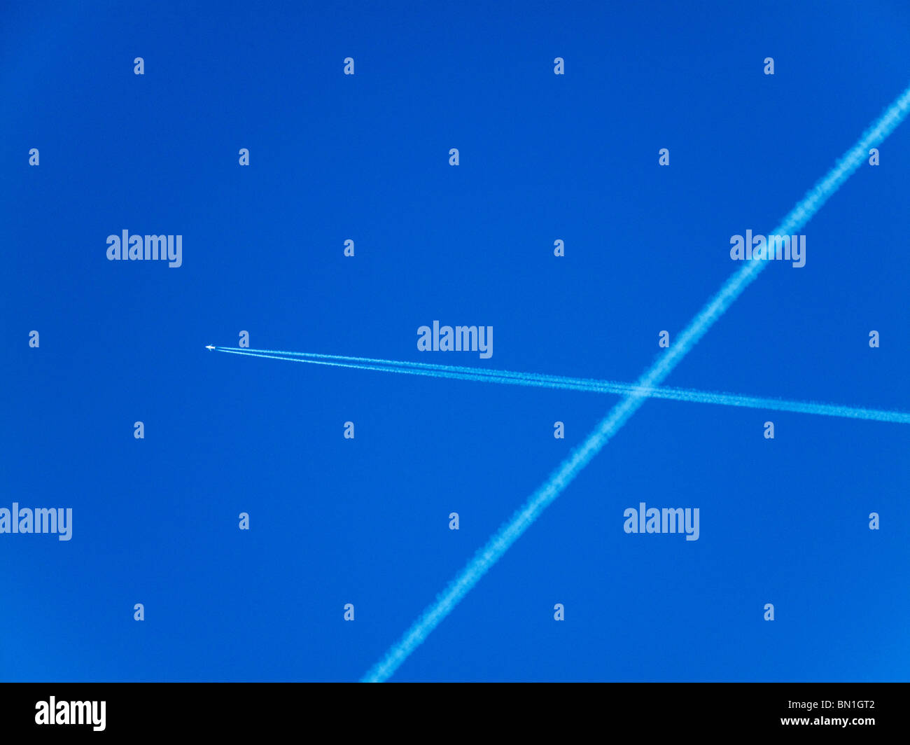 jet in the sky Stock Photo Alamy